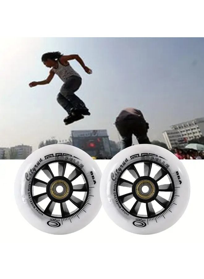 6 قطع من عجلات التزلج السوداء SpeedCore HyperGlide مقاس 100 مم مع محاور بوليمر Durolast وتقنية ImpactShield - Image 1